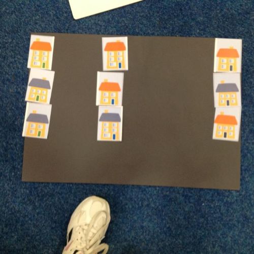 Maths Challenge Week: LA worked in groups to sort nine houses according to different criteria such as the colour of the front door or the number of windows: